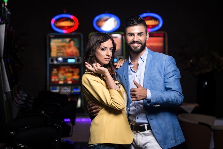 Live dealer studio setup showing multiple camera angles and real croupiers at roulette and blackjack tables